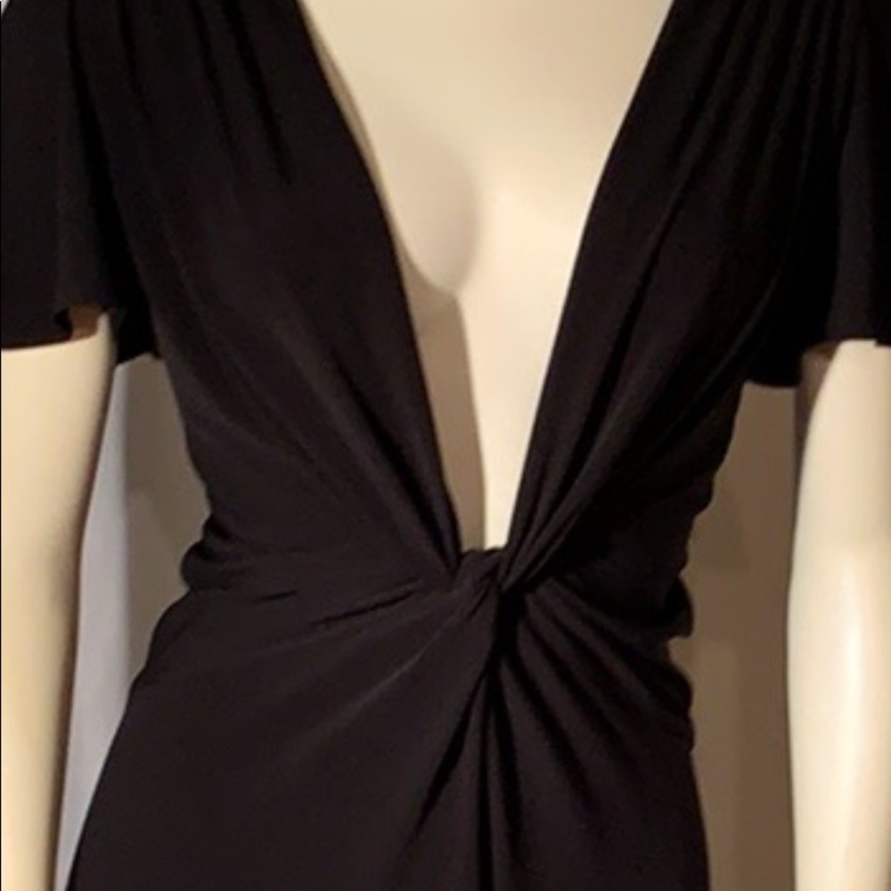 Low cut front, open lower back dress